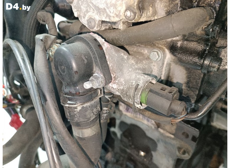 Фланец (тройник) системы охлаждения к Volkswagen Passat undefined г.