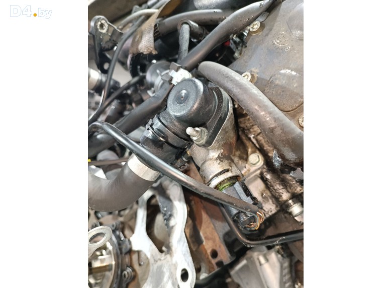 Фланец (тройник) системы охлаждения к Audi A6 undefined г.