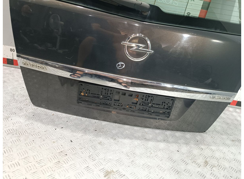 Накладка подсветки номера к Opel Zafira, 2012г.