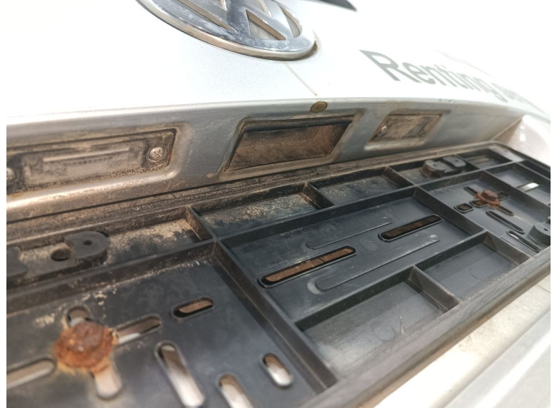 Накладка подсветки номера к Volkswagen Touran, 2004г.