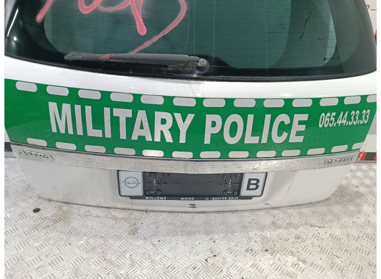 Накладка подсветки номера к Opel Astra, 2007г.