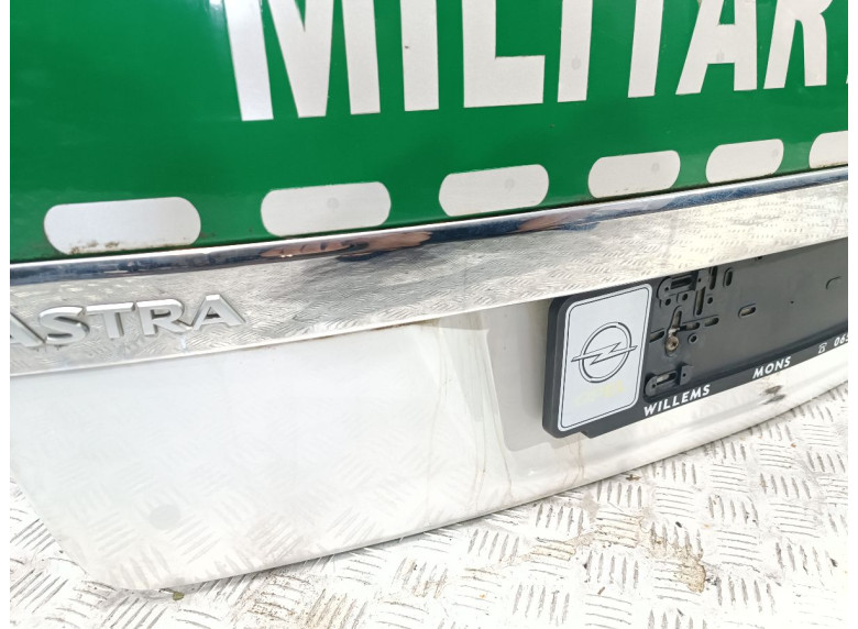 Накладка подсветки номера к Opel Astra, 2007г.