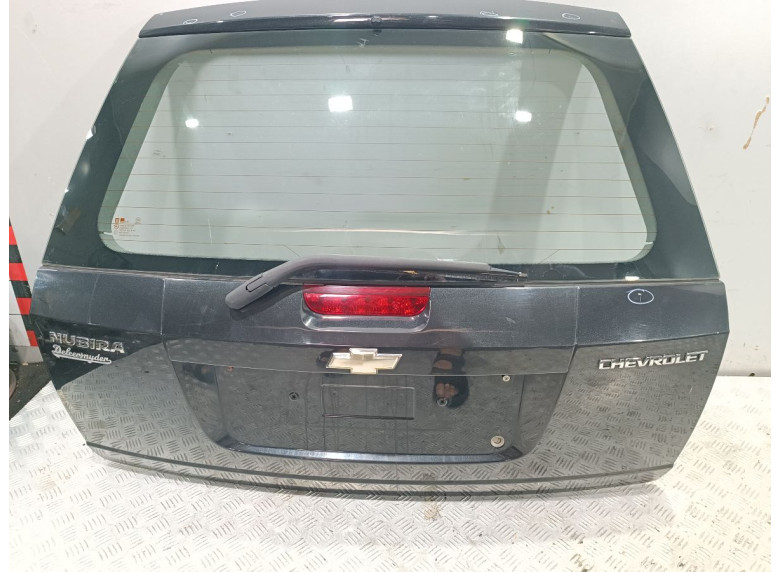 Накладка подсветки номера к Chevrolet Nubira, 2007г.