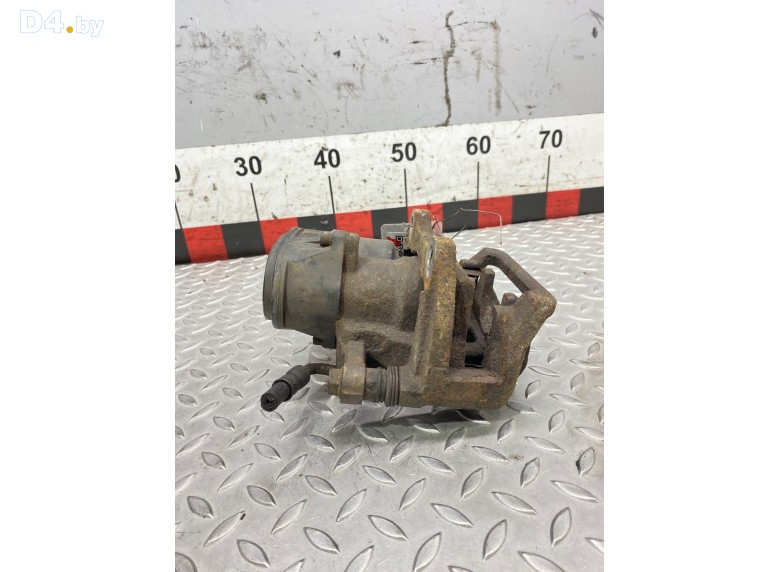 Суппорт задний левый к Geely Atlas undefined г.