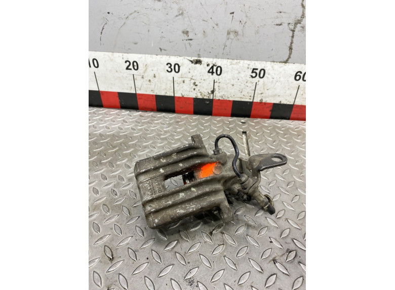 Суппорт задний левый к Volkswagen Golf, 2006г.