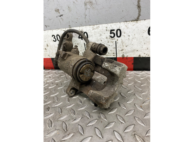 Суппорт задний правый к Volkswagen Golf, 2006г.