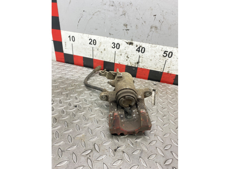 Суппорт задний левый к Volkswagen Golf, 2006г.