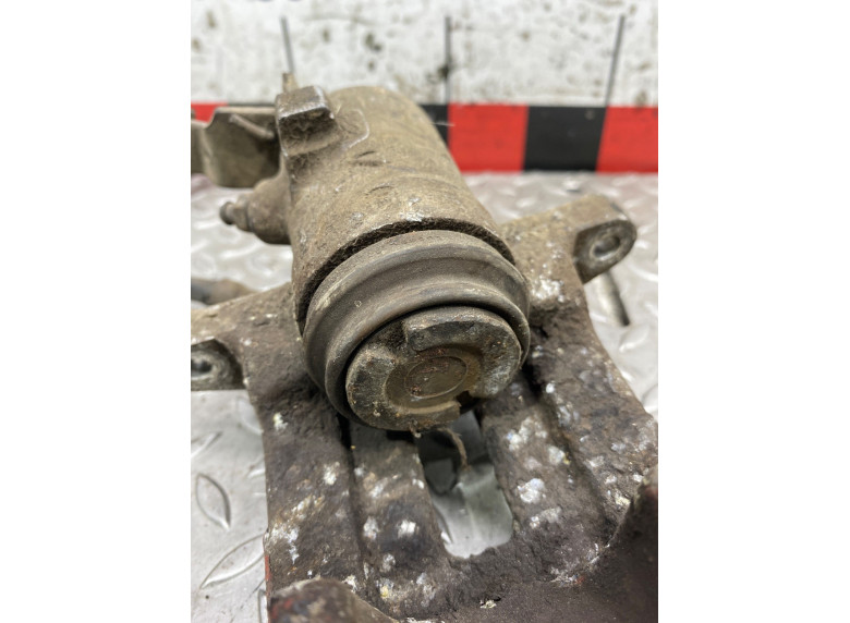 Суппорт задний левый к Volkswagen Golf, 2006г.