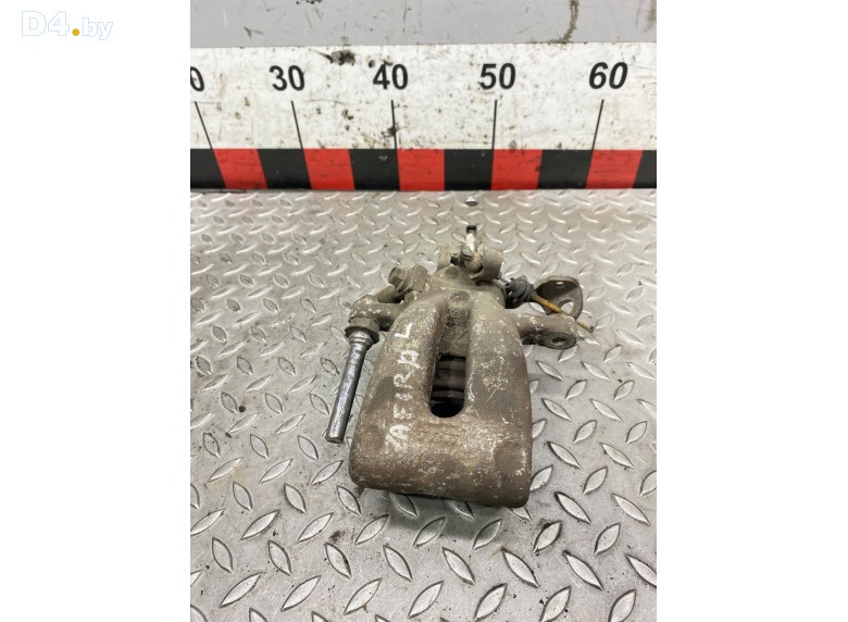 Суппорт задний левый к Opel Zafira undefined г.