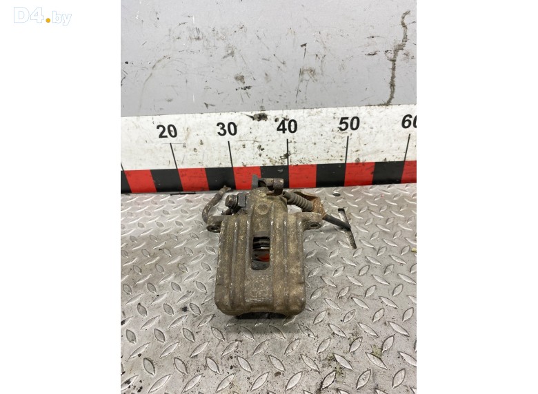 Суппорт задний левый к Volkswagen Golf undefined г.