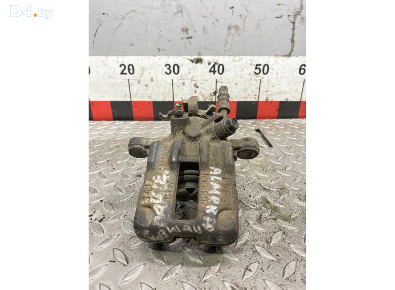 Суппорт задний левый к Nissan Almera undefined г.