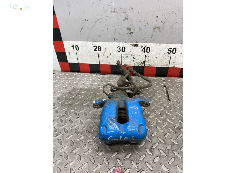 Суппорт задний левый к Volkswagen Golf undefined г.