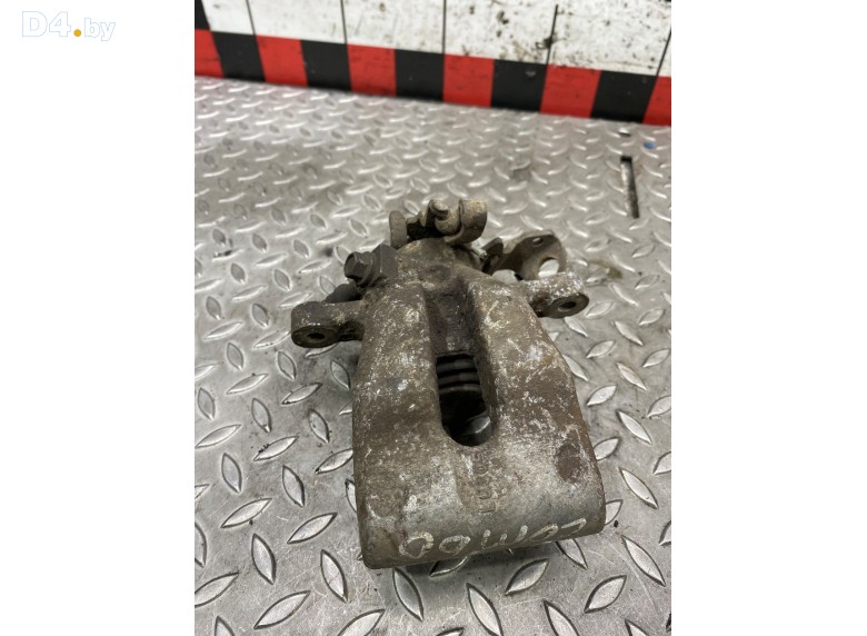 Суппорт задний левый к Opel Combo undefined г.