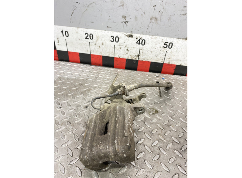 Суппорт задний левый к Volkswagen Golf, 2005г.