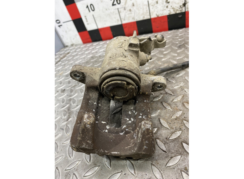 Суппорт задний правый к Volkswagen Golf, 2006г.