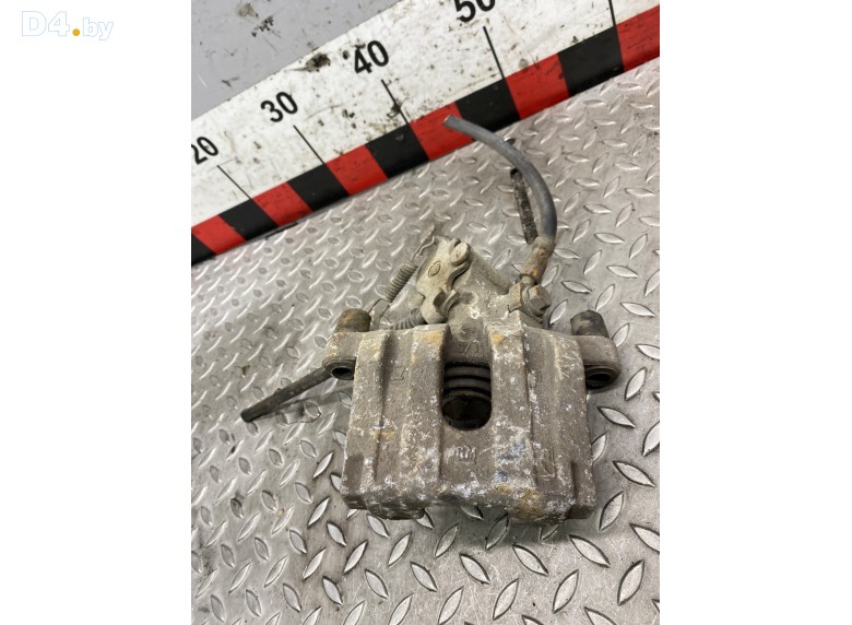 Суппорт задний левый к Opel Vectra undefined г.