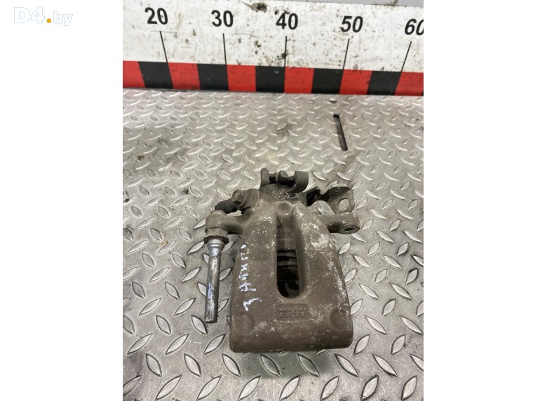 Суппорт задний левый к Opel Zafira undefined г.