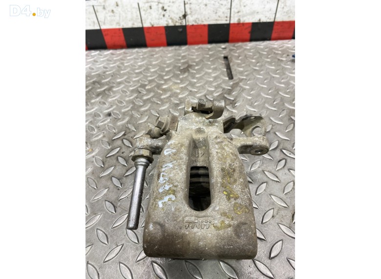 Суппорт задний левый к Opel Zafira undefined г.