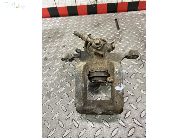 Суппорт задний левый к Opel Astra undefined г.