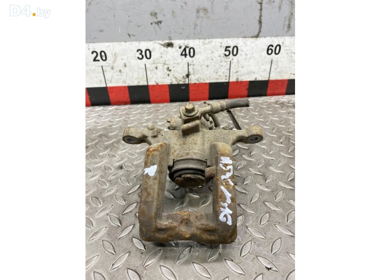 Суппорт задний правый к Opel Astra undefined г.