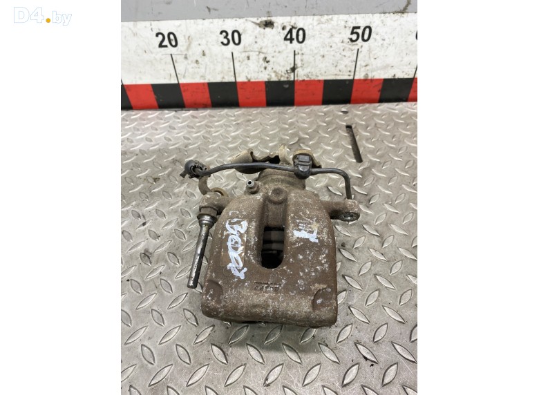 Суппорт задний левый к Peugeot 3008 undefined г.