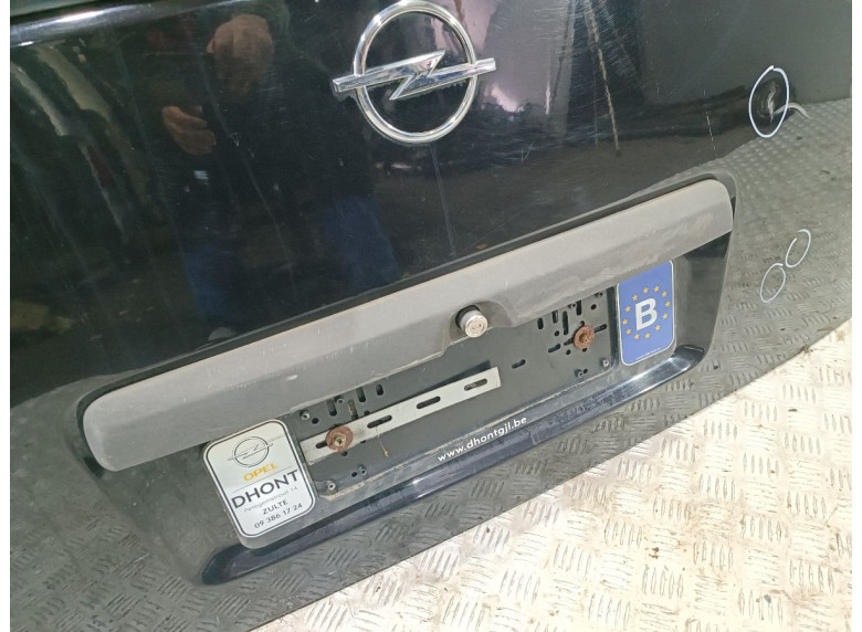 Накладка подсветки номера к Opel Combo, 2006г.