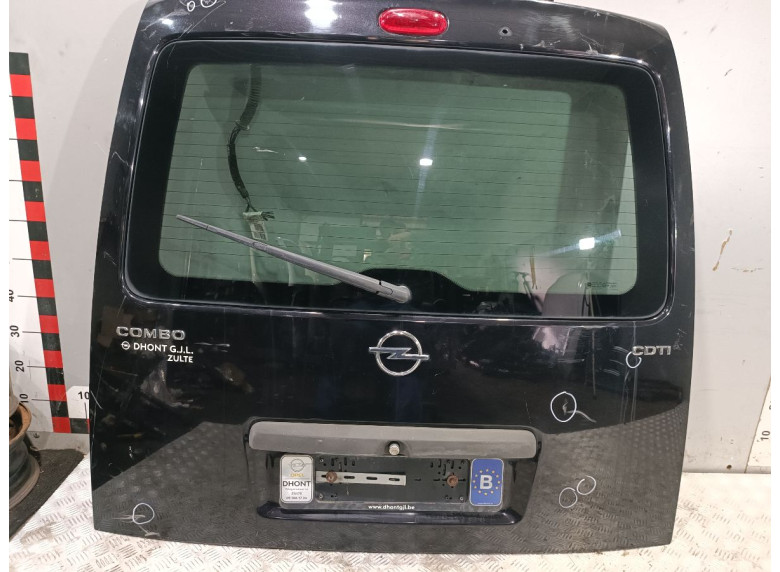 Накладка подсветки номера к Opel Combo, 2006г.