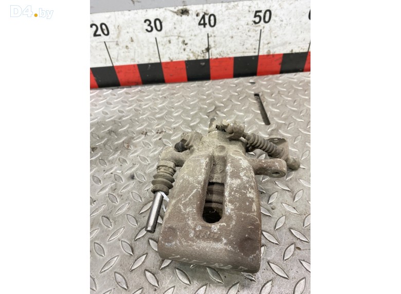 Суппорт задний левый к Opel Zafira undefined г.