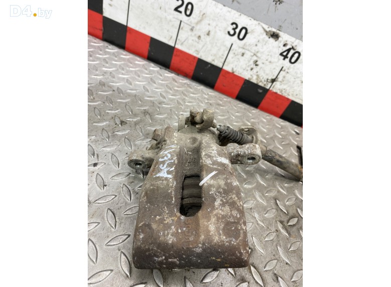 Суппорт задний левый к Opel Astra undefined г.