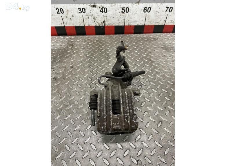 Суппорт задний левый к Volkswagen Golf undefined г.