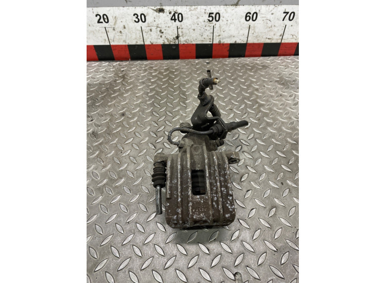 Суппорт задний левый к Volkswagen Golf, 2006г.