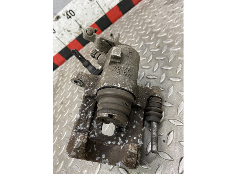 Суппорт задний левый к Volkswagen Golf, 2006г.