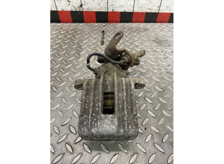 Суппорт задний левый к Volkswagen Golf, 2006г.