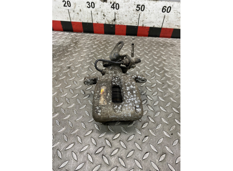 Суппорт задний левый к Volkswagen Golf, 2006г.