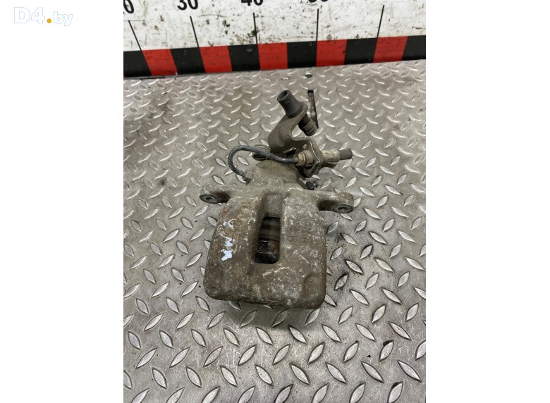 Суппорт задний левый к Volkswagen Golf undefined г.