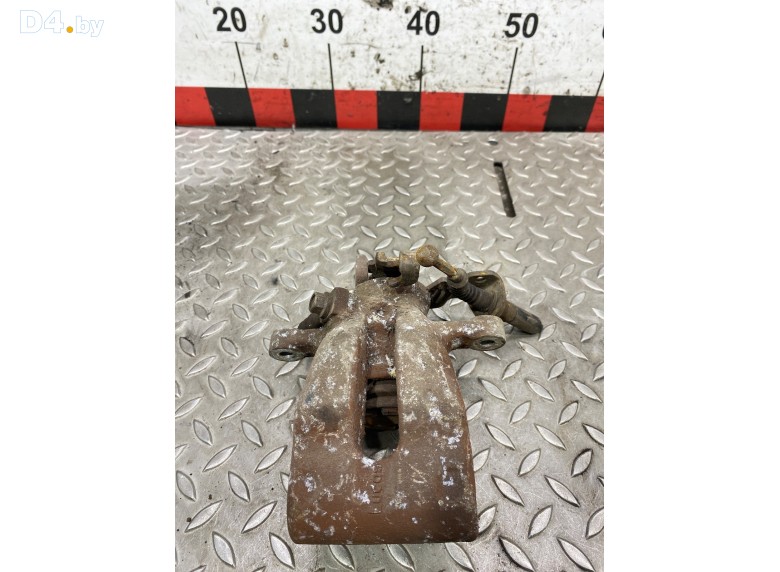 Суппорт задний левый к Opel Astra undefined г.