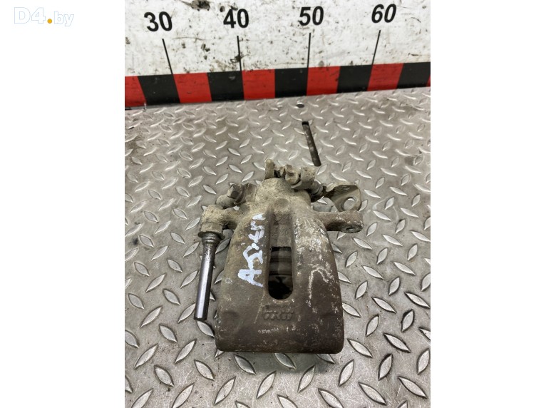 Суппорт задний левый к Opel Astra undefined г.