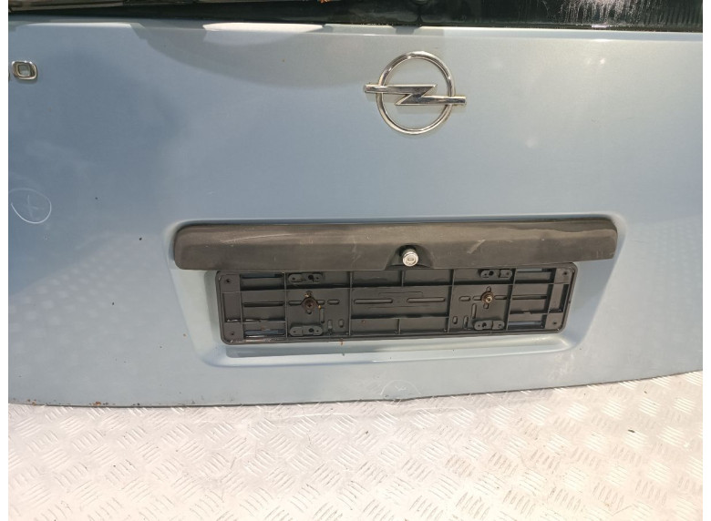 Накладка подсветки номера к Opel Combo, 2006г.