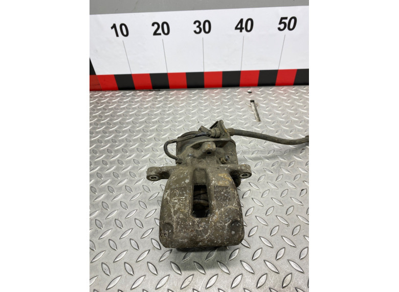 Суппорт задний левый к Volkswagen Passat, 2007г.