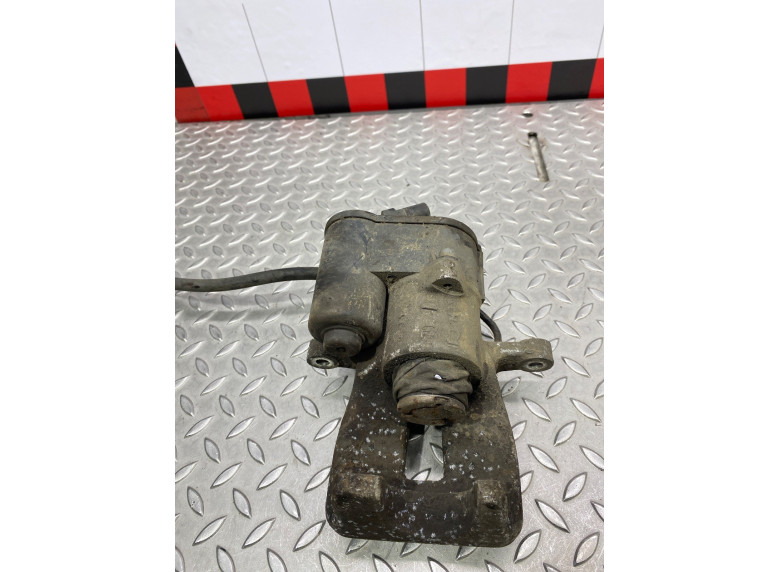 Суппорт задний левый к Volkswagen Passat, 2007г.