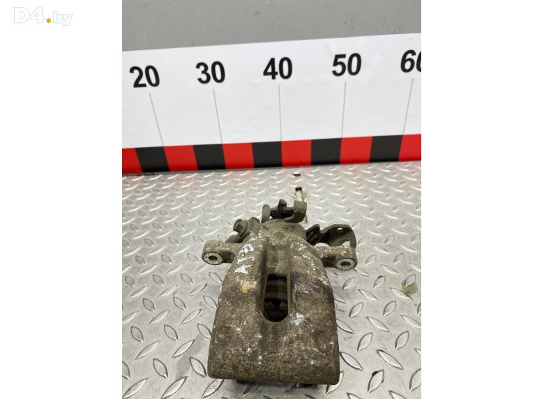 Суппорт задний левый к Opel Astra undefined г.