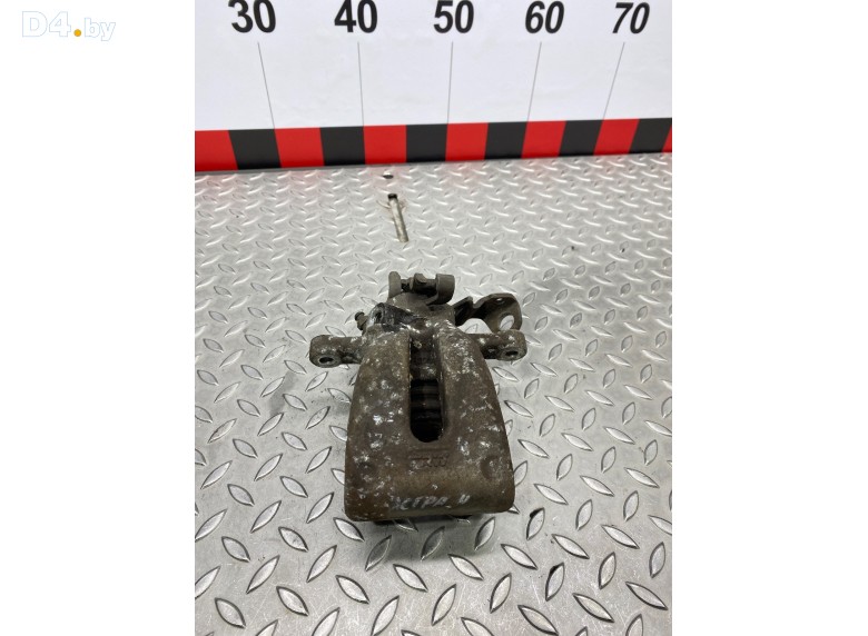 Суппорт задний левый к Opel Astra undefined г.