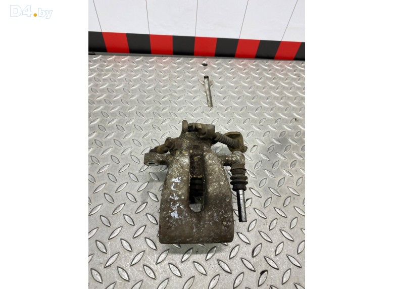 Суппорт задний левый к Opel Astra undefined г.