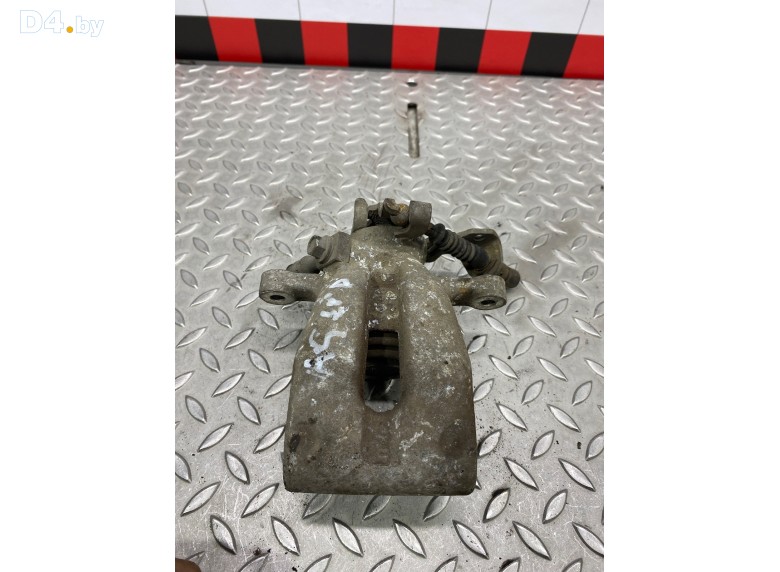 Суппорт задний левый к Opel Astra undefined г.