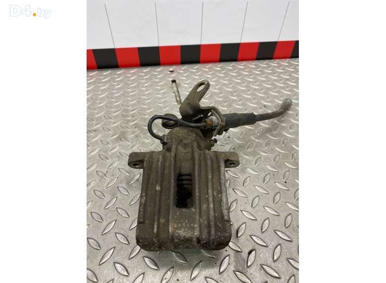 Суппорт задний левый к Volkswagen Golf undefined г.