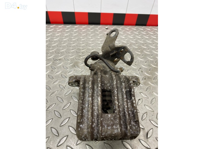 Суппорт задний левый к Volkswagen Golf undefined г.