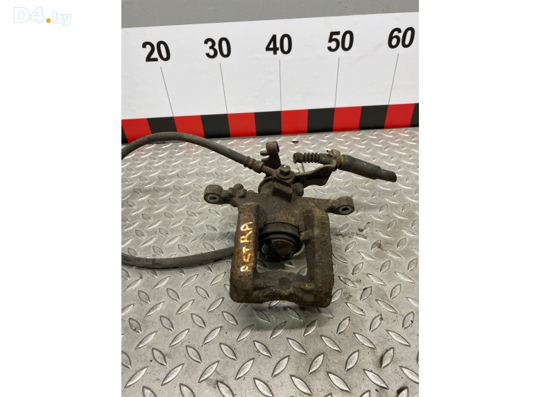 Суппорт задний левый к Opel Astra undefined г.