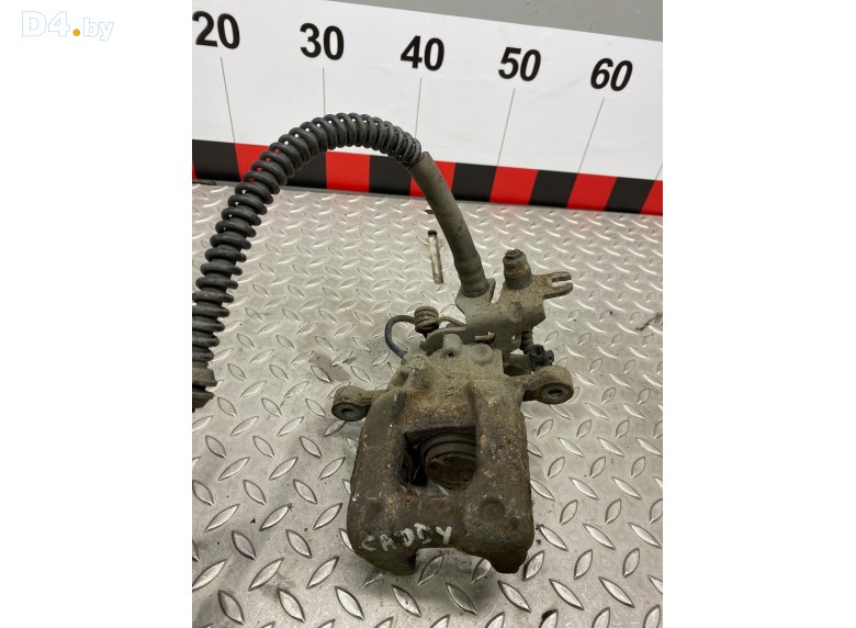 Суппорт задний правый к Volkswagen Caddy undefined г.