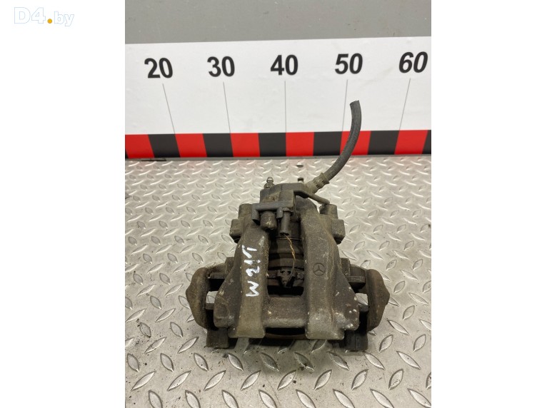 Суппорт задний левый к Mercedes EW211 undefined г.