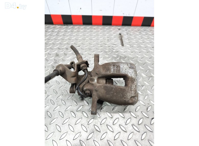 Суппорт задний левый к Volkswagen Touran undefined г.